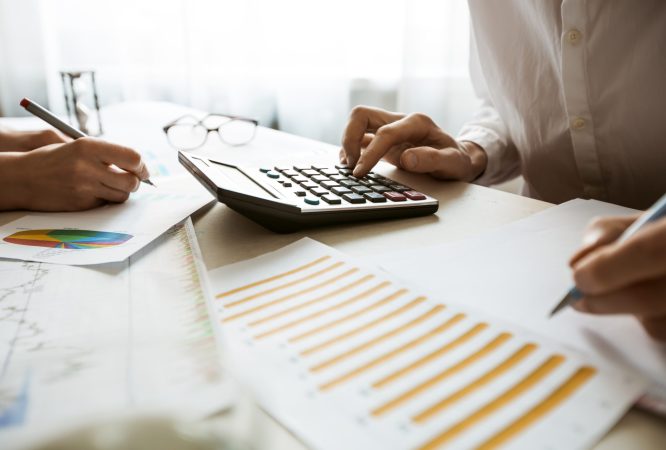 hands-accountant-prepare-financial-report-calculator